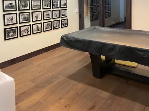 Recreation room with a framed-photo wall, pool table, and wood ceiling